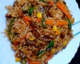 A picture of step 6 of Mexican Rice with Red Sauce.
