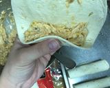 A picture of step 4 of Creamy Baked Chicken Taquitos.