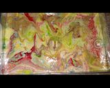 A picture of step 4 of Rainbow Swiss rolls.
