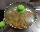 A picture of step 6 of Gobi and Mutter Sabji.