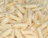 A picture of step 4 of Cheesy white sauce Pasta.