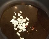 Foto del paso 3 de la receta: Calamarcitos en cebolla caramelizada y judías de Santa Pau