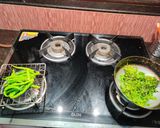 A picture of step 1 of Green chillies garlic coriander thecha.