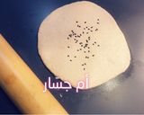 صورة لخطوة 8 من وصفة العيش (الخبز البلدي)