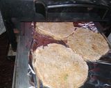 A picture of step 3 of Lauki Roti(tandoori) with aloo tamatar, karela and salad.