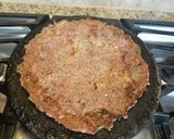 A picture of step 4 of Oats & ragi roti/thick pancake.