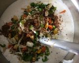 A picture of step 3 of Veggie Idlis with coconut and red chutney.
