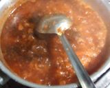 A picture of step 8 of Brain Masalah with tomatoes.