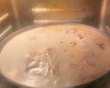 A picture of step 4 of Cassava Cake with Coconut and Pecans.