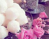 صورة لخطوة 7 من وصفة كرات جوز الهند (رافايلو)