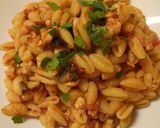 A picture of step 7 of Gnocchetti sardi with black olive and sword fish ragu.