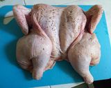 A picture of step 1 of Spatch cocked roast chicken.