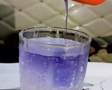 A picture of step 7 of Masala Crispy French Fries with Blue heaven Drink.