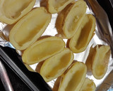 Foto del paso 4 de la receta: Patatas rellenas con pollo y pimientos