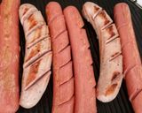 A picture of step 2 of Frankfurter and bratwurst mixed grill with my currywurst sauce.