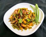 A picture of step 4 of French Beans and Potato Fry with Onions.