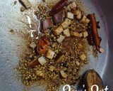 A picture of step 1 of Goan Chicken Xacuti.