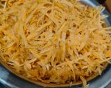 A picture of step 2 of Gajar Halwa.