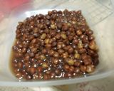 A picture of step 2 of Kumror Chakka Vegan pumpkin curry with black chickpeas.