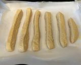A picture of step 5 of Garlic Salt Breadsticks.