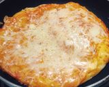 A picture of step 15 of Veg delite pizza on tawa with homemade pizza base.