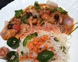 A picture of step 6 of Kungpao chicken with fried rice.