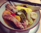 A picture of step 9 of Pork rib soup with pickled mustard greens.