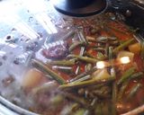 A picture of step 9 of Drumsticks curry.