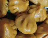 आंब्याच्या रसातील मोदक (ambyachya rasatil modak recipe in marathi) रेसिपी स्टेप 9 फोटो 