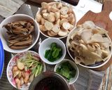 A picture of step 1 of Clear Tom Yum Soup with Three Mushrooms (Vegetarian).