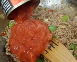 A picture of step 8 of My Chilli Beef Topped with melted Cheese. 😘.