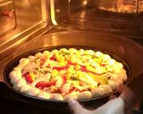 A picture of step 8 of Cheese bomb pizza.