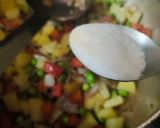 A picture of step 3 of Vegetable Dalia.