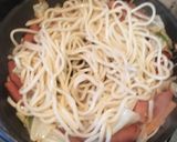 A picture of step 6 of Stir-Fried Udon with Spam and Mixed Vegetables.