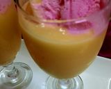 A picture of step 2 of Mango 🥭 milk shake with strawberry ice cream 🍦.
