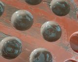 Une image de l'étape 7 de Chocolats au gianduja croustillant.