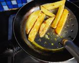 A picture of step 4 of Spicy finger chips.