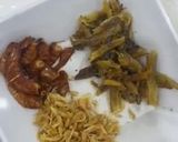 A picture of step 1 of Corn and beans palm oil rice.