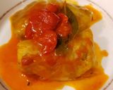 A picture of step 8 of Niños envueltos (stuffed cabbage rolls).