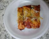 A picture of step 13 of Copycat dominos pizza cheese stuffed bread sticks.