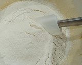 Foto del paso 5 de la receta: Magdalenas 🧁 de limón y coco rellenas de leche condensada