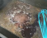 A picture of step 3 of Sticky red wine, rosemary and thyme gravy.