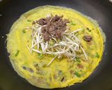 A picture of step 3 of Quick and Easy Bánh Xèo on a Rainy Day with a Nonstick Pan.