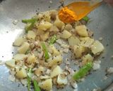 A picture of step 3 of Aloo Poha / Kanda Poha.