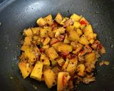 A picture of step 2 of Kaddu ki sabzi (pumpkin sabzi).