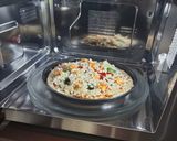 A picture of step 2 of Italian Pizza.