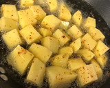Foto del paso 3 de la receta: Patatas fritas con aderezo