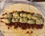 Une image de l'étape 2 de Rouleau farci tomates, fromage (origan, épices italiennes et pavot bleu).