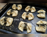 A picture of step 26 of Bow tie buns.