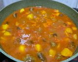 A picture of step 6 of Spicy Meatball and Potato Stew.